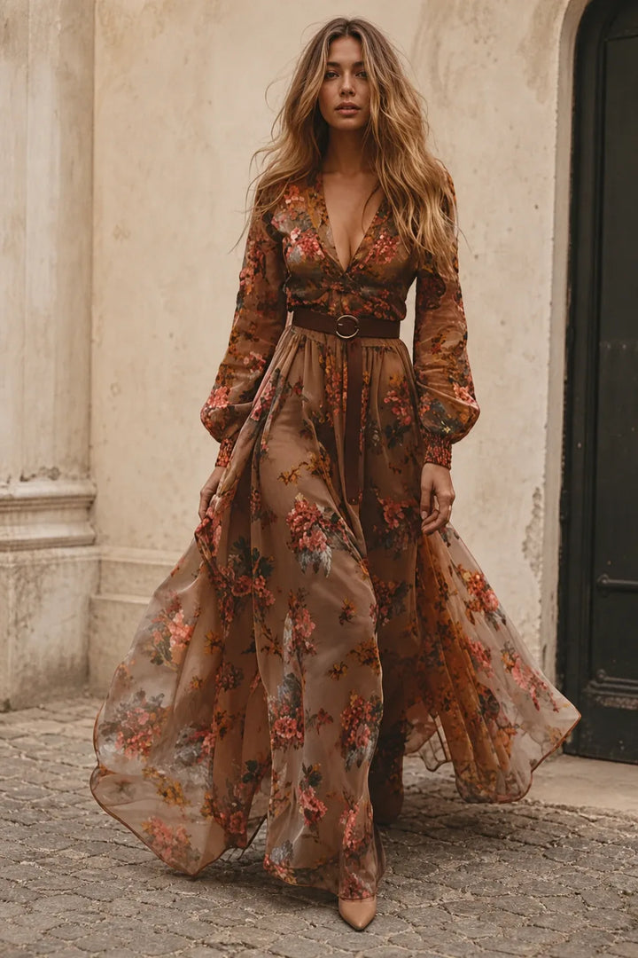 Dark brown embroidered boho maxi dress on a model in a contrapposto stance