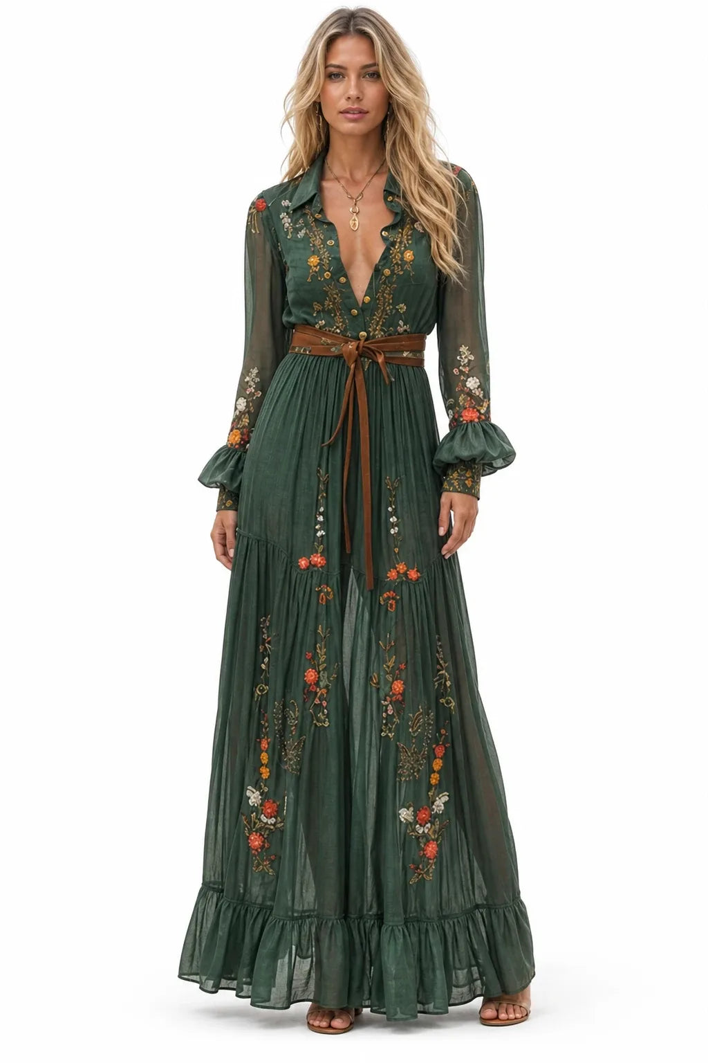 Green embroidered boho maxi dress on a model in a contrapposto stance
