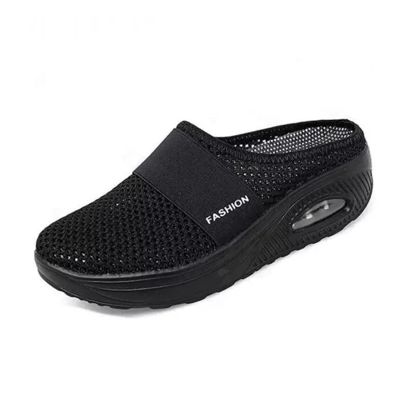 Black cushioned slip-on mule sneaker