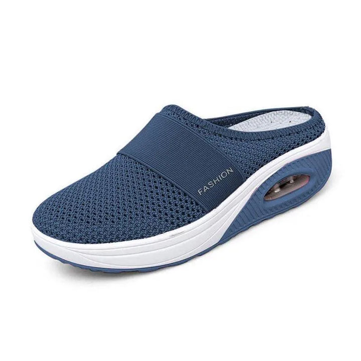 Dark blue cushioned slip-on mule sneaker