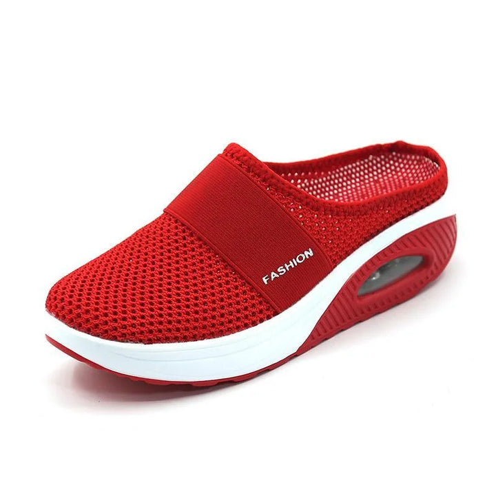 Red cushioned slip-on mule sneaker, front view