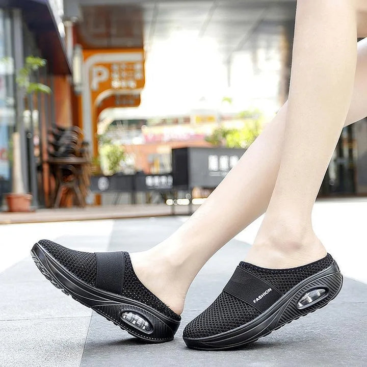 Red cushioned slip-on mule sneaker, top-down view