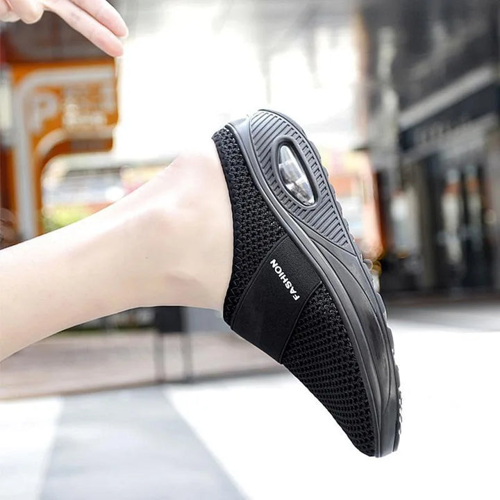 Red cushioned slip-on mule sneaker, interior view