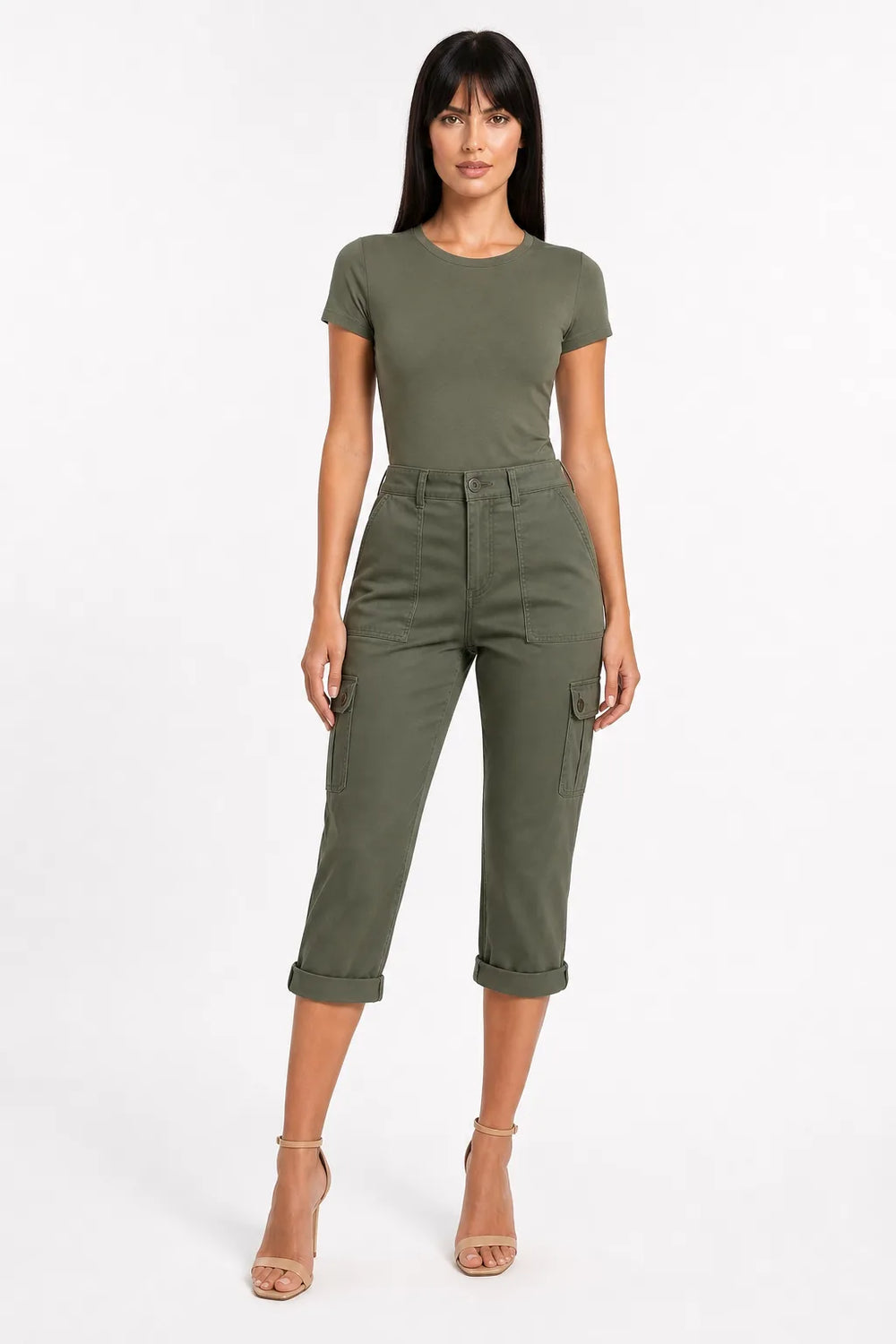 Army green cargo capri pants with side pockets on a model in a contrapposto stance