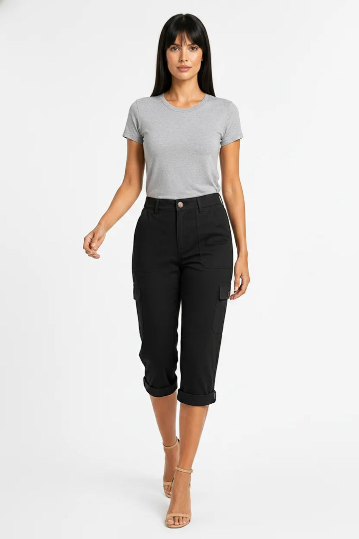 Black cargo capri pants with side pockets on a model in natural movement