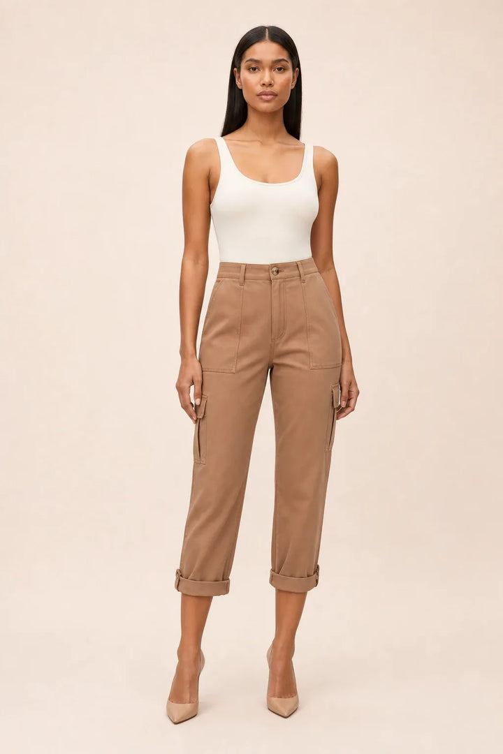 Coffee-colored cargo capri pants on a model in a contrapposto stance, with side cargo pockets