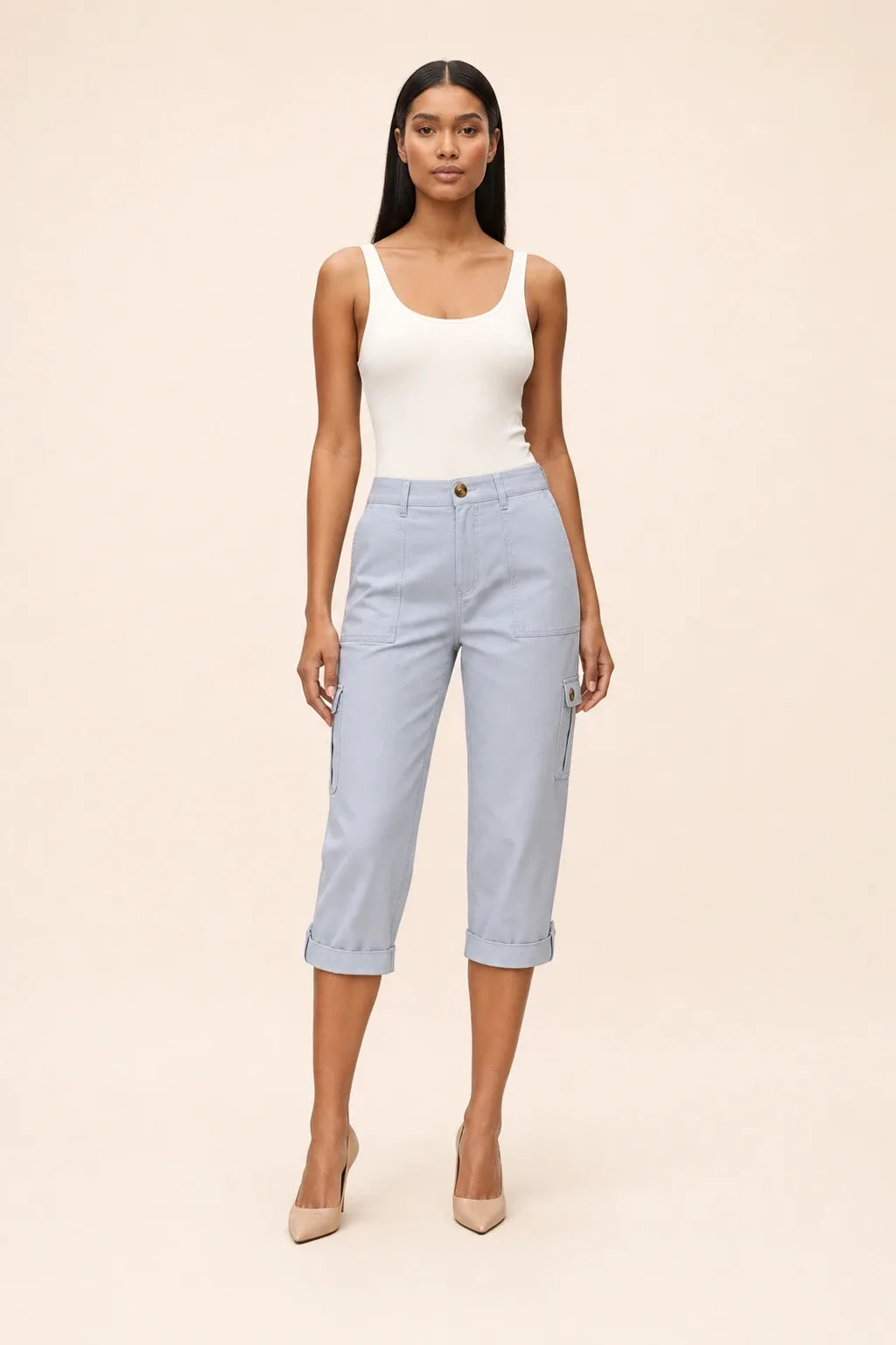 Light blue cargo capri pants on a model in a contrapposto stance, with side cargo pockets