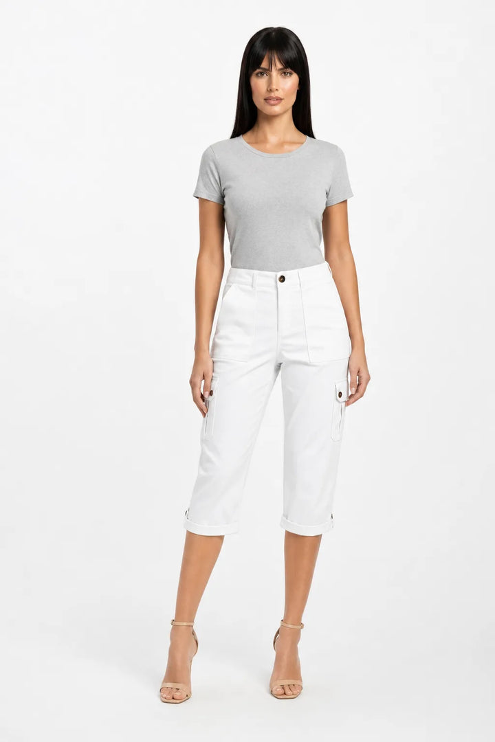 White cargo capri pants with side pockets on a model in a contrapposto stance