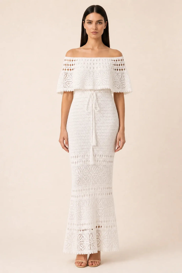White crochet ruffle maxi dress on model in contrapposto stance