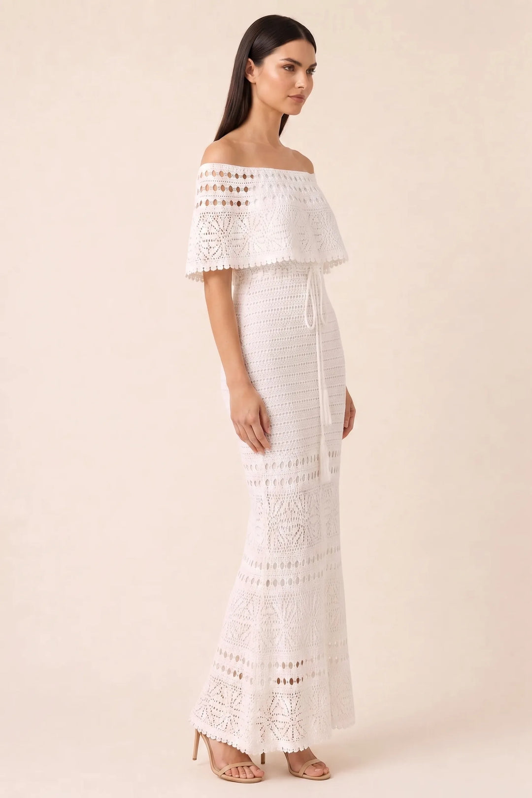 White crochet ruffle maxi dress on model in three-quarter turn