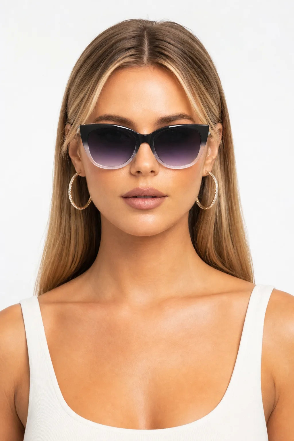 Model wearing oversized two-tone black cat eye sunglasses, front-facing close-up