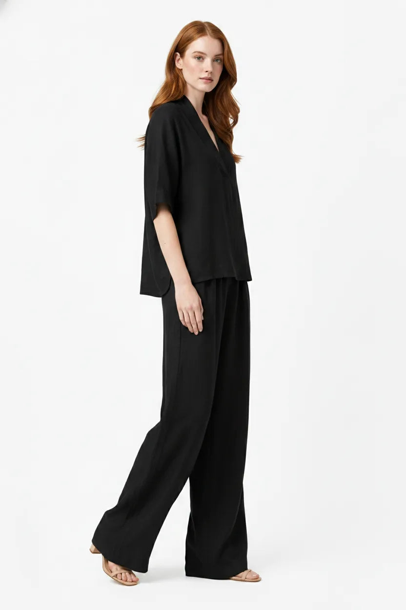 Black linen kimono trouser set on a model in a three-quarter turn