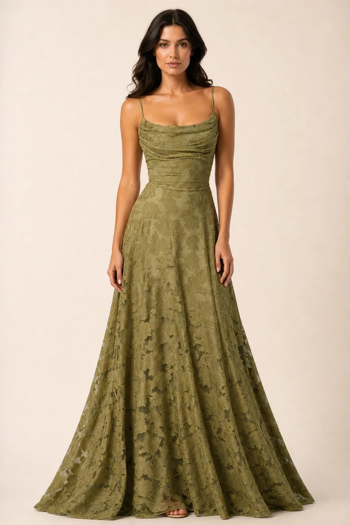 Olive green lace open-back gown on a model in a contrapposto stance