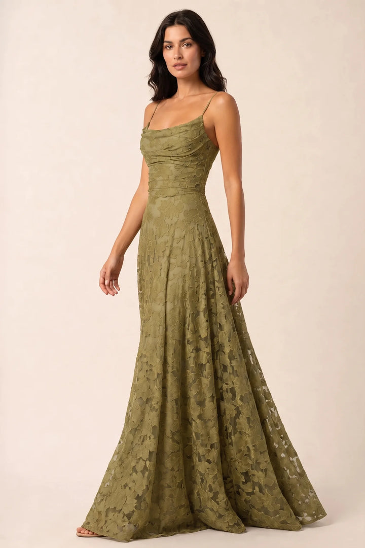 Olive green lace open-back gown on a model in a three-quarter turn