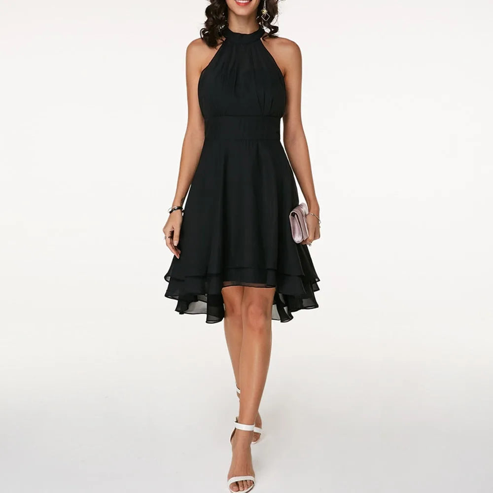 Black tiered ruffle halter top on model, side view