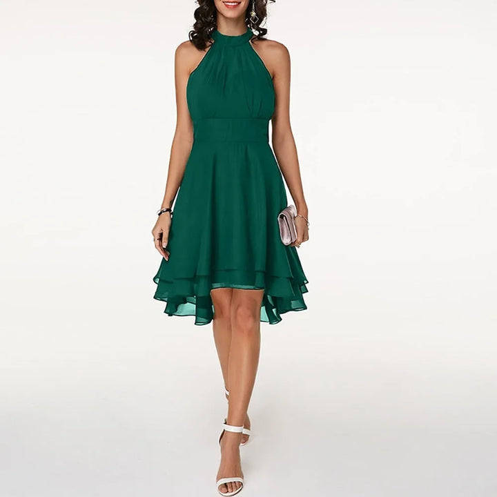 Green tiered ruffle halter top on model, full-length view