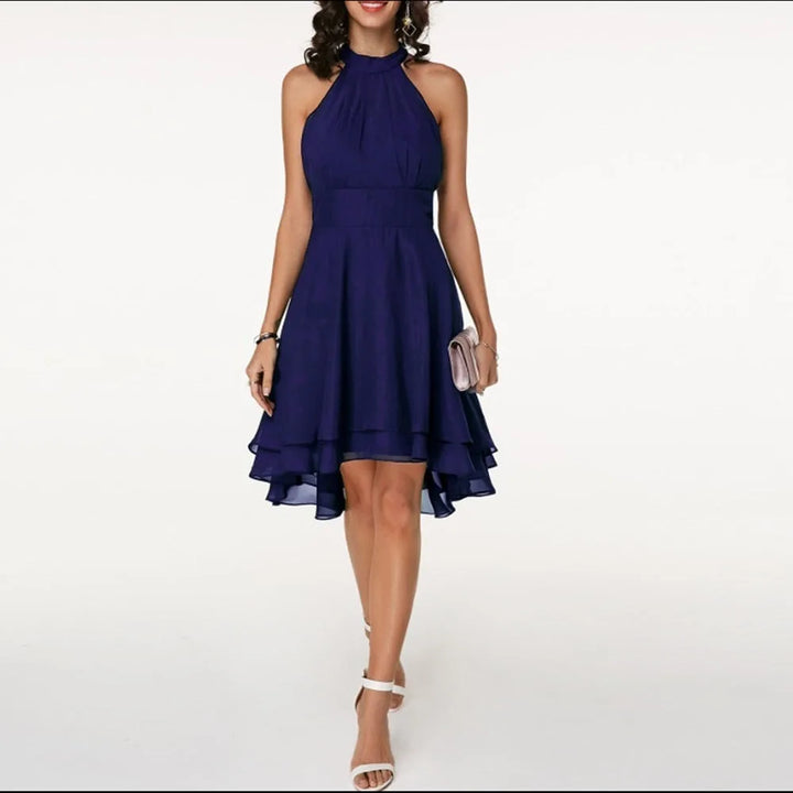 Navy blue tiered ruffle halter top, close-up fabric and ruffle detail