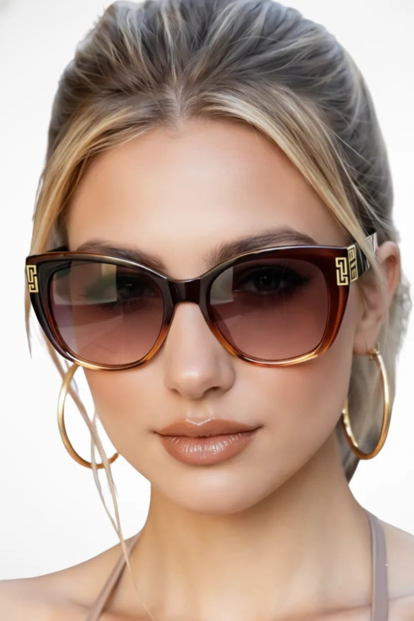 Oversized square cat-eye sunglasses in brown gradient, flat product shot