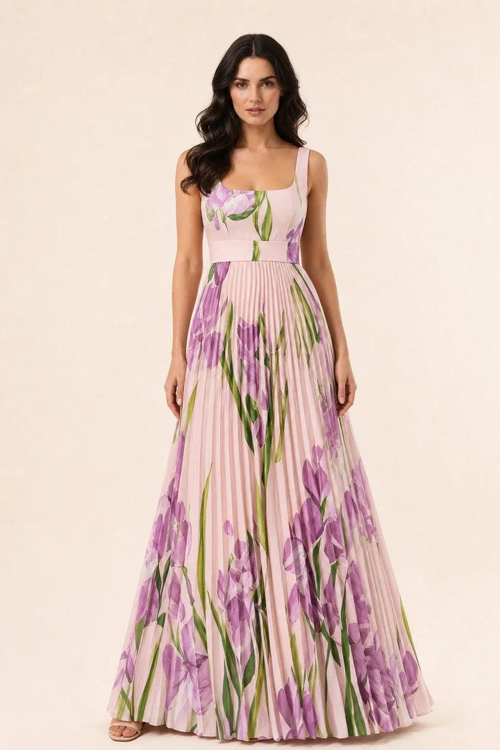 Pink pleated floral gown on model in contrapposto stance