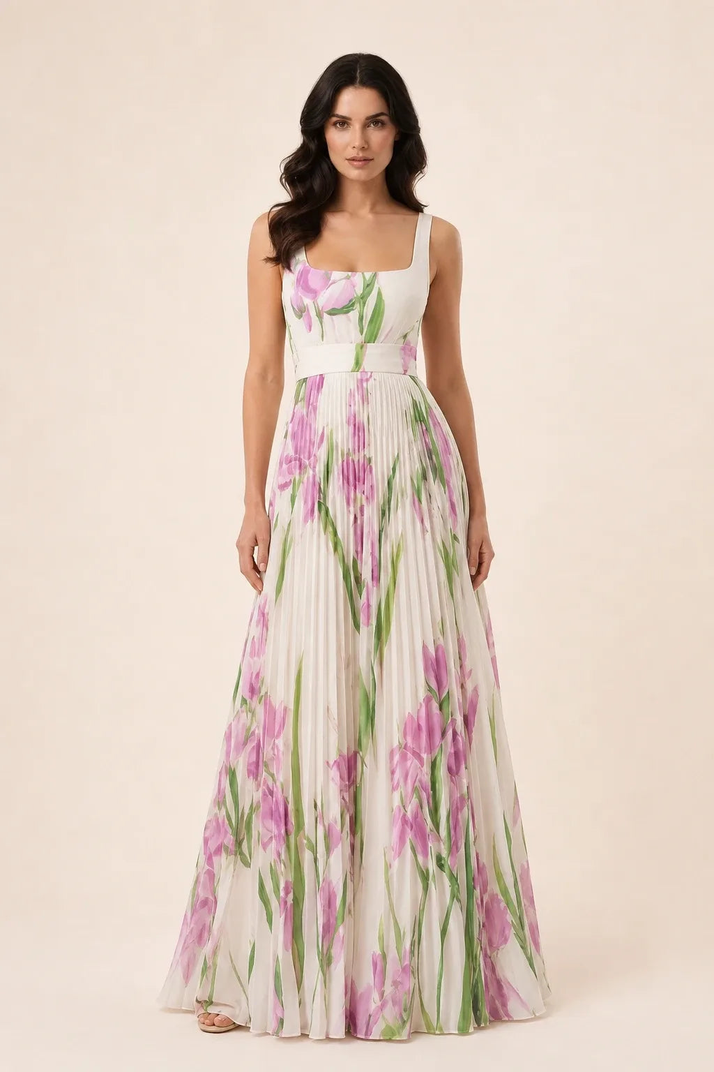 White pleated floral gown on model in contrapposto stance