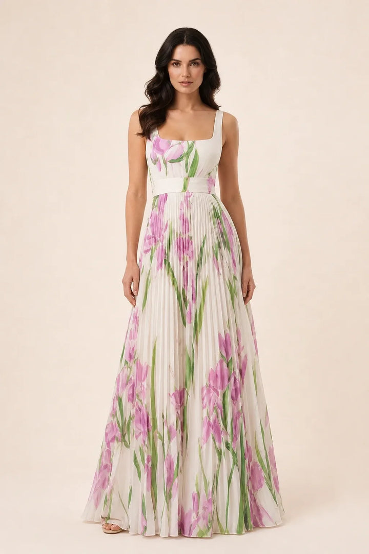 White pleated floral gown on model in contrapposto stance