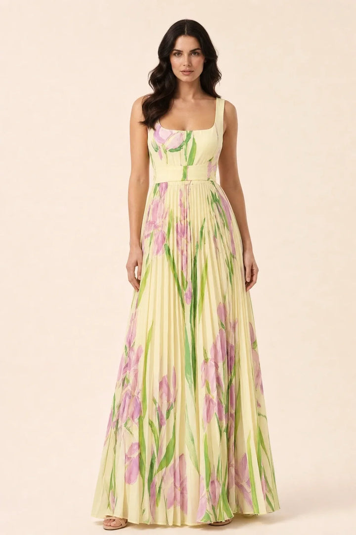 Yellow pleated floral gown on model in contrapposto stance