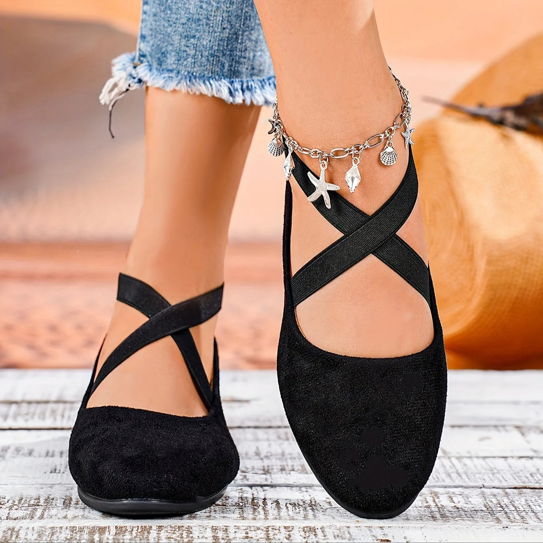 Black cross strap low wedge flat, front view