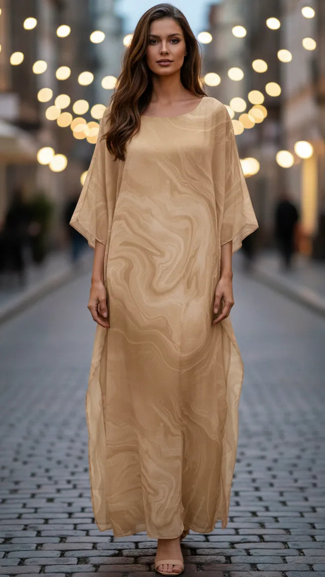 Yellow marble print kaftan on model, front-facing full-length view