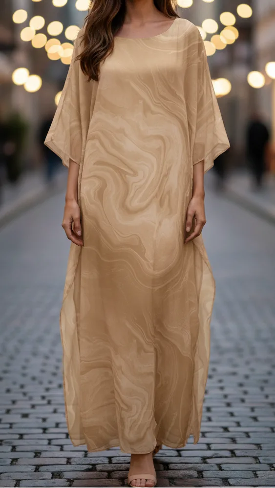 Yellow marble print kaftan on model, additional full-length angle view